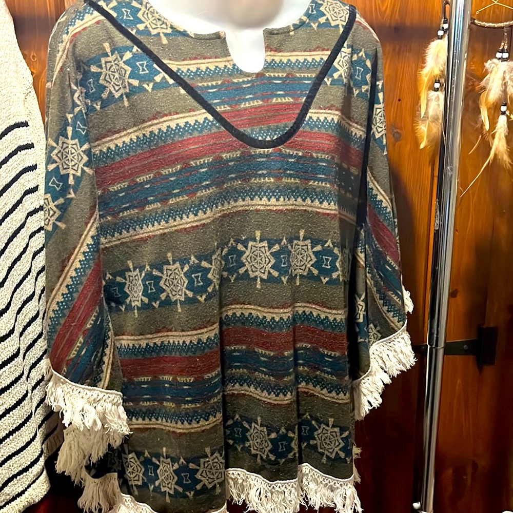 Earthbound company poncho styled top.